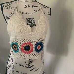 Crocheted backless crop halter top.